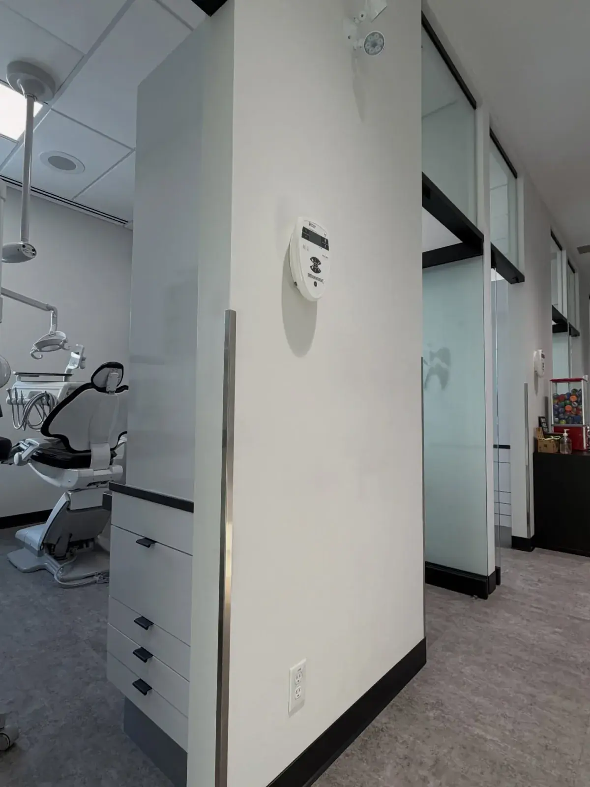 A freshly painted Calgary dental office with crisp white walls, finished by Chamos Painting